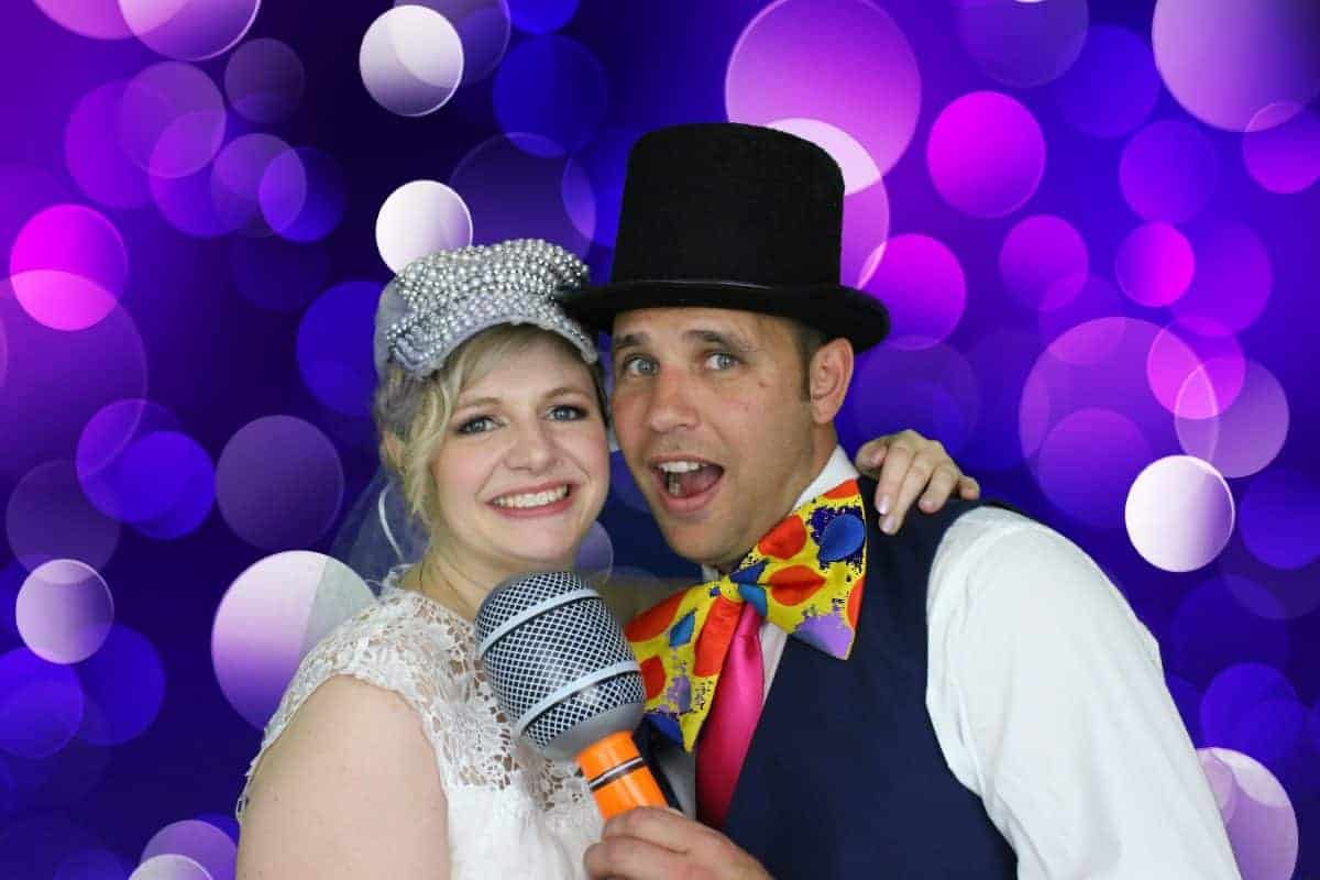 bride and groom in the wedding photo booth hire